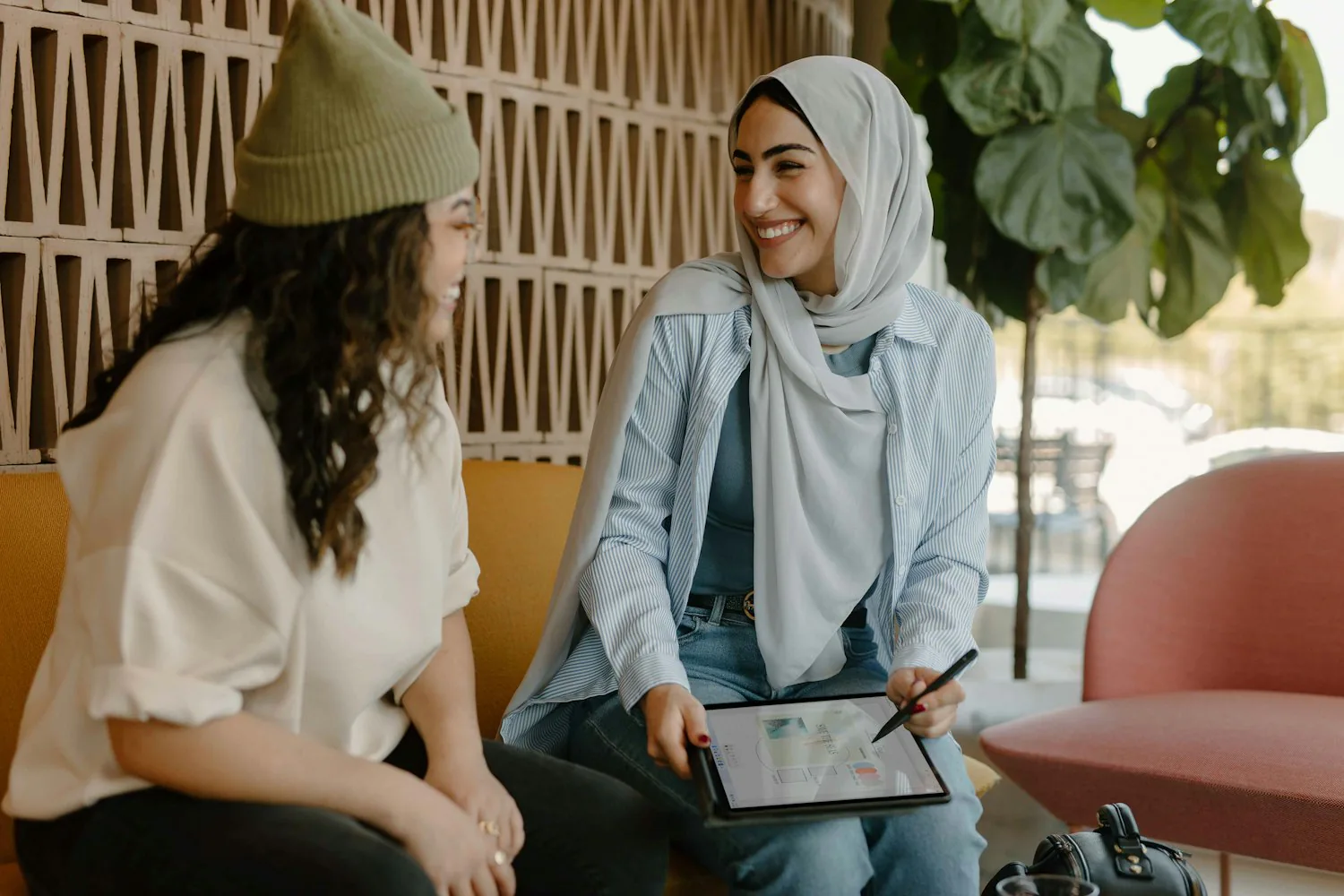 Two colleagues talking and smiling